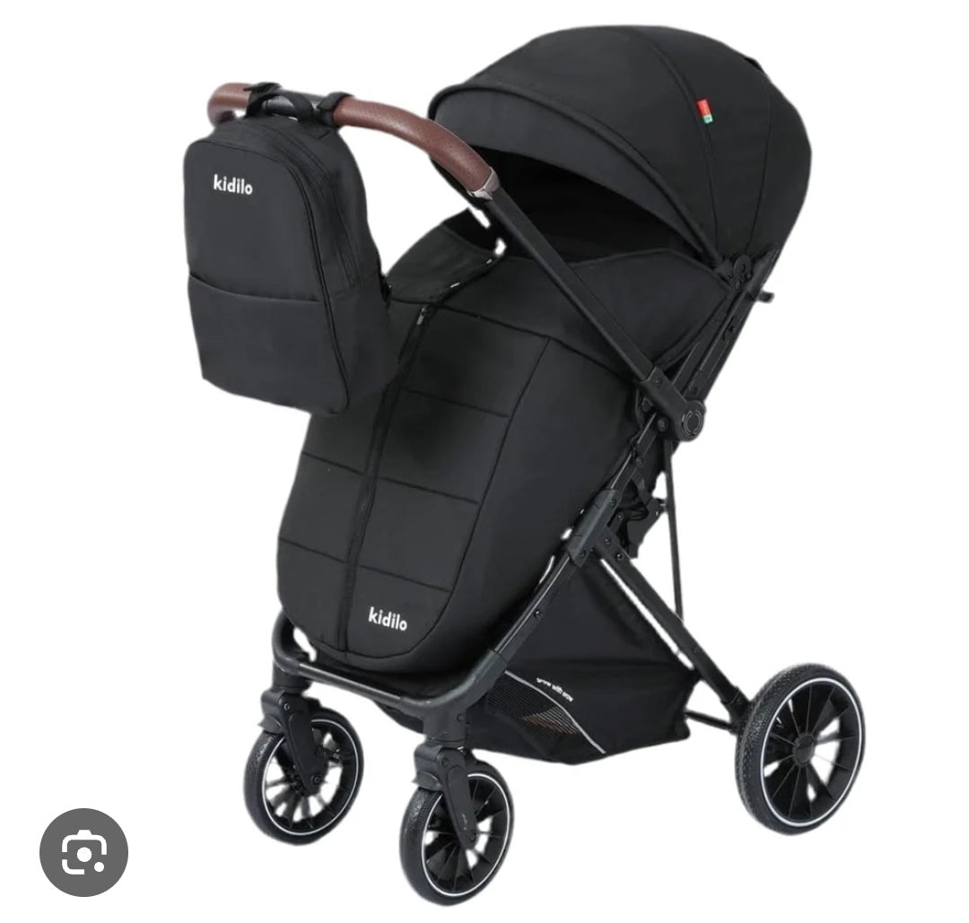 Poussette noir réversible avec sac maman